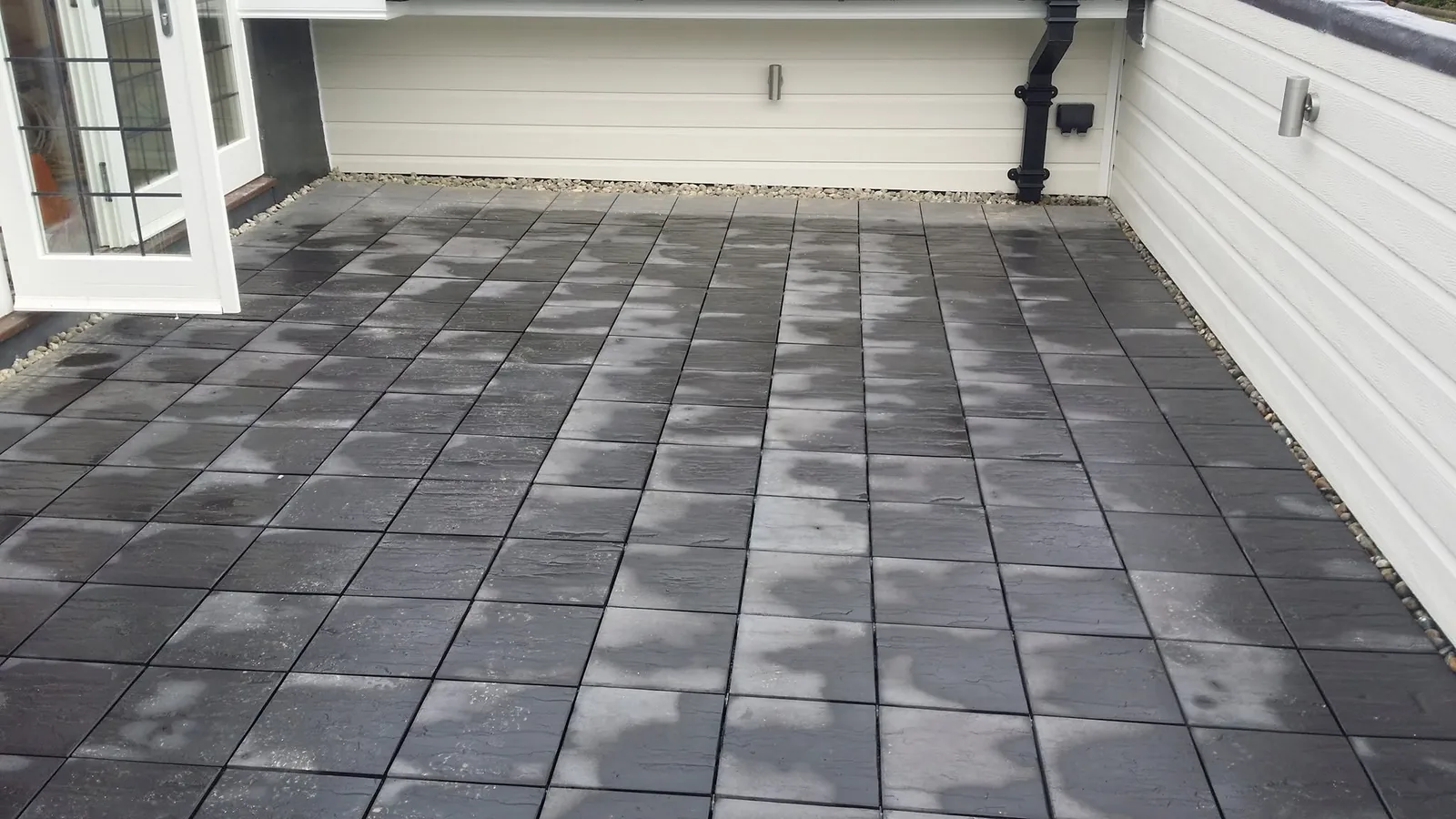 Completed mastic asphalt balcony with paving slabs in Walton-on-the-Hill